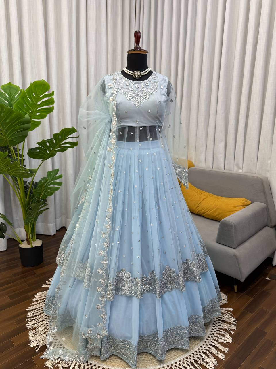 Sky Blue Faux Georgette Gown Lehenga
